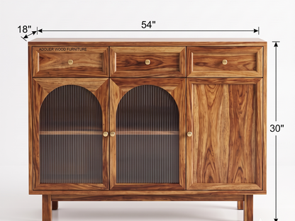 A wooden sideboard cabinet with two arched glass-front doors, 3 drawers, and one cabinet doors, shown with dimension labels: 54 inches wide, 30 inches tall, and 18 inches deep. The cabinet has a warm medium-brown wood grain finish and small round brass-toned knobs.