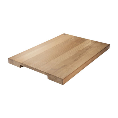 Wooden cutting board on a white background