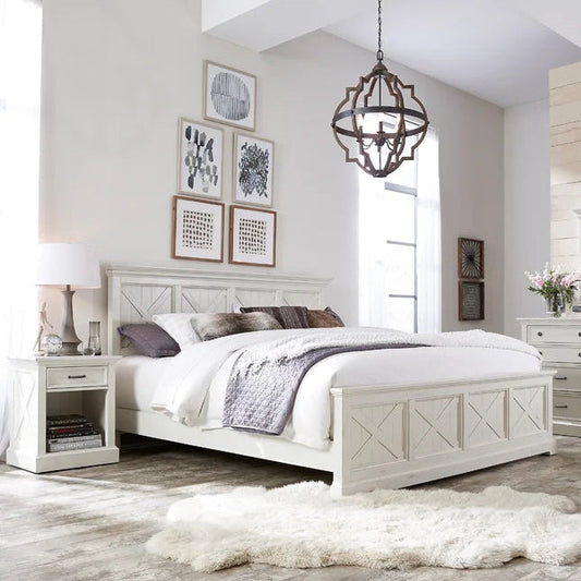 Neatly arranged bedroom with a white bed, nightstands, and decor.
