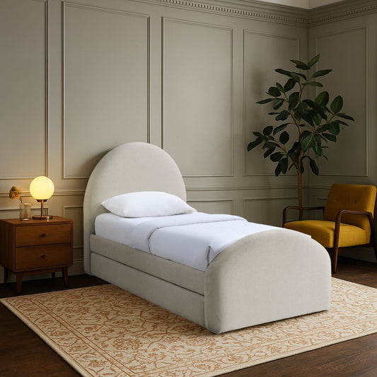 Neatly made bed with white bedding in a bedroom setting with a nightstand and chair.