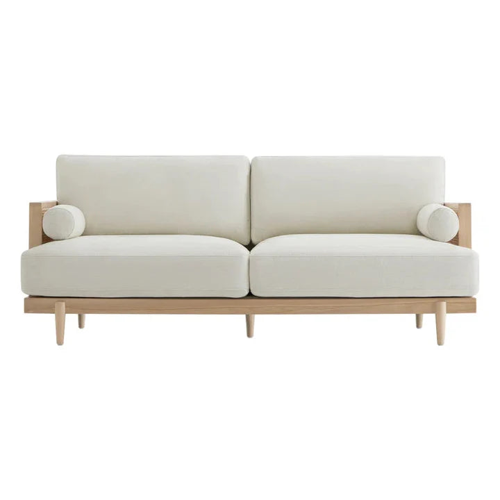 Beige sofa with wooden frame on a white background