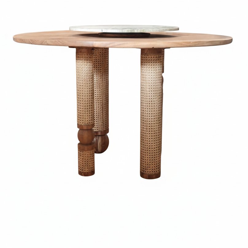 Round wooden table with wicker legs on a white background
