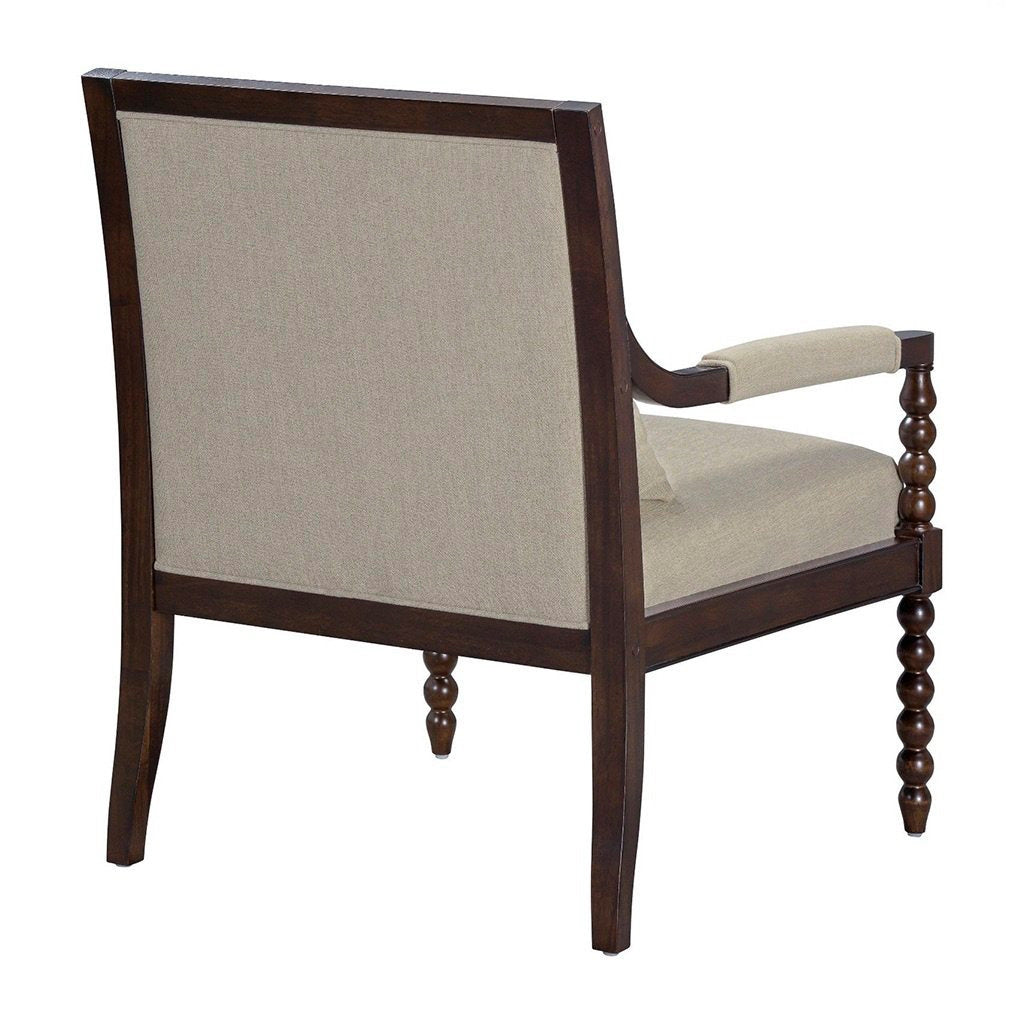 Chair with wooden frame and beige cushion on a white background