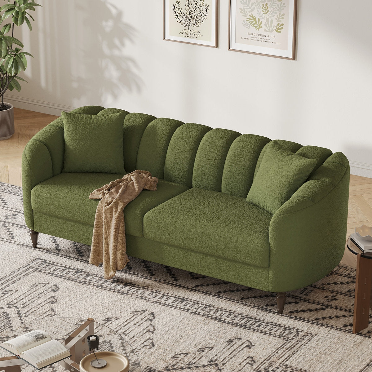 Green sofa in a living room with a patterned rug and decor elements.