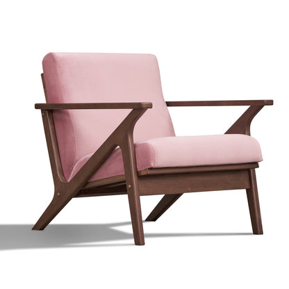 Pink armchair with wooden frame on a white background