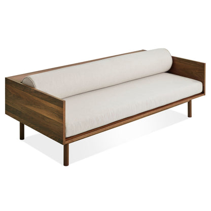 Wooden sofa with white cushions on a white background