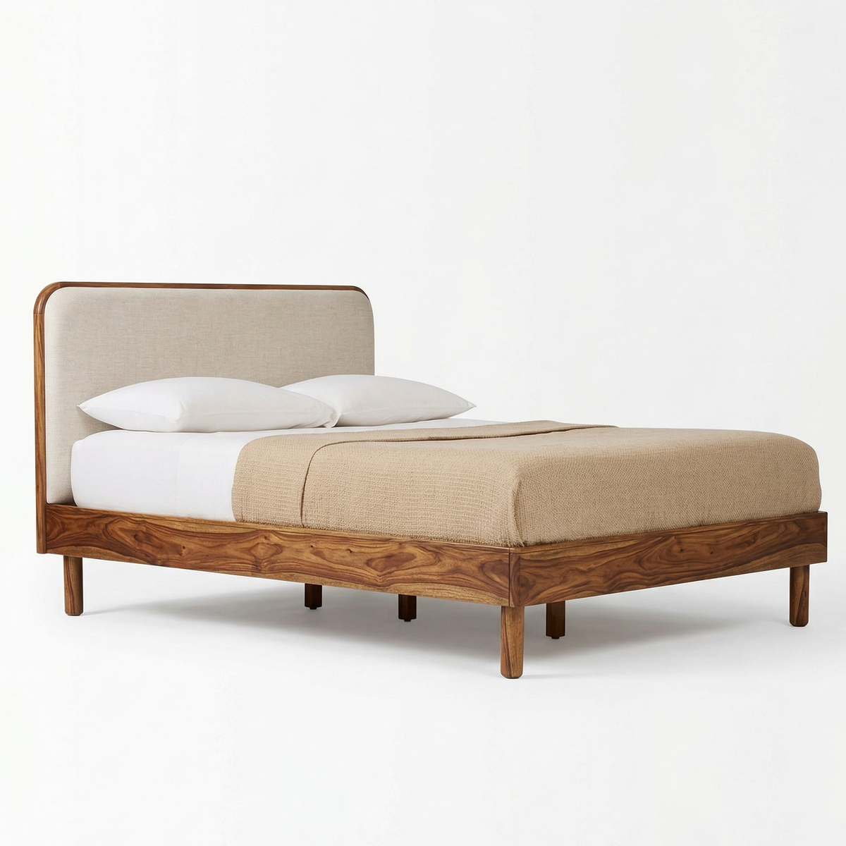 Wooden bed with beige headboard and bedding on a white background