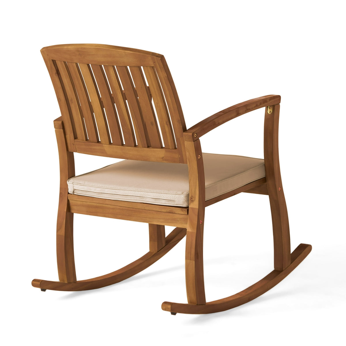 Wooden rocking chair with beige cushion on a white background