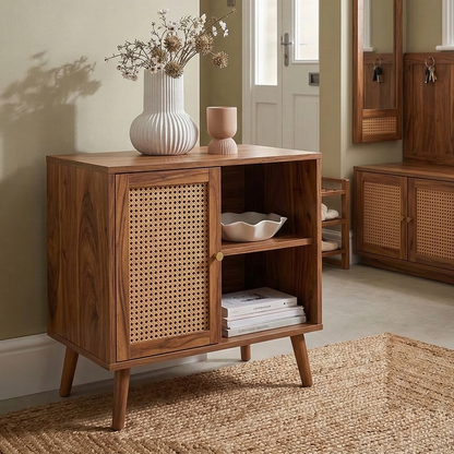 Wooden sideboard with wicker door in a room setting