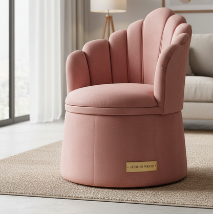 Pink armchair with scalloped backrest in a living room setting