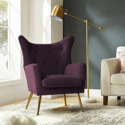 Purple armchair with gold legs in a modern living room setting
