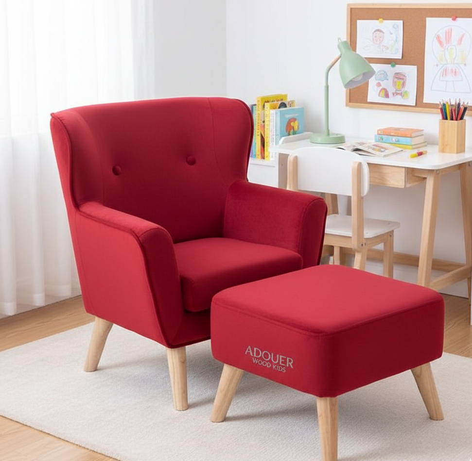 Red armchair with ottoman in a room with a desk and lamp