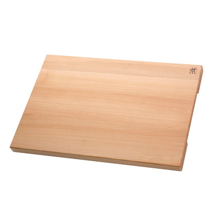Wooden cutting board on a white background