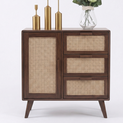Wooden cabinet with rattan doors and drawers on a white background