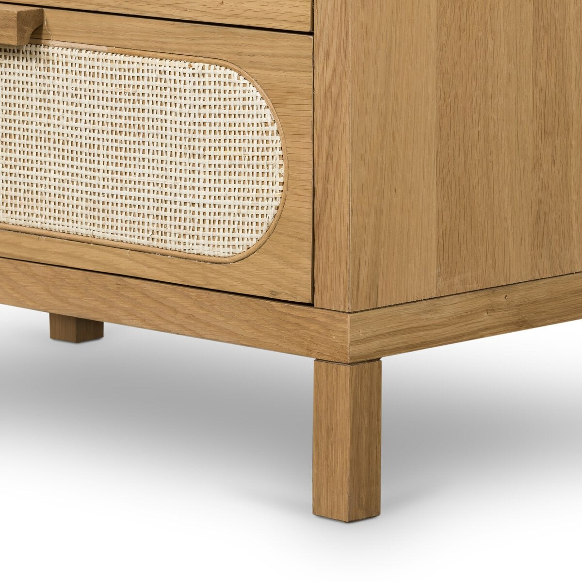 Wooden cabinet with wicker panel on a white background