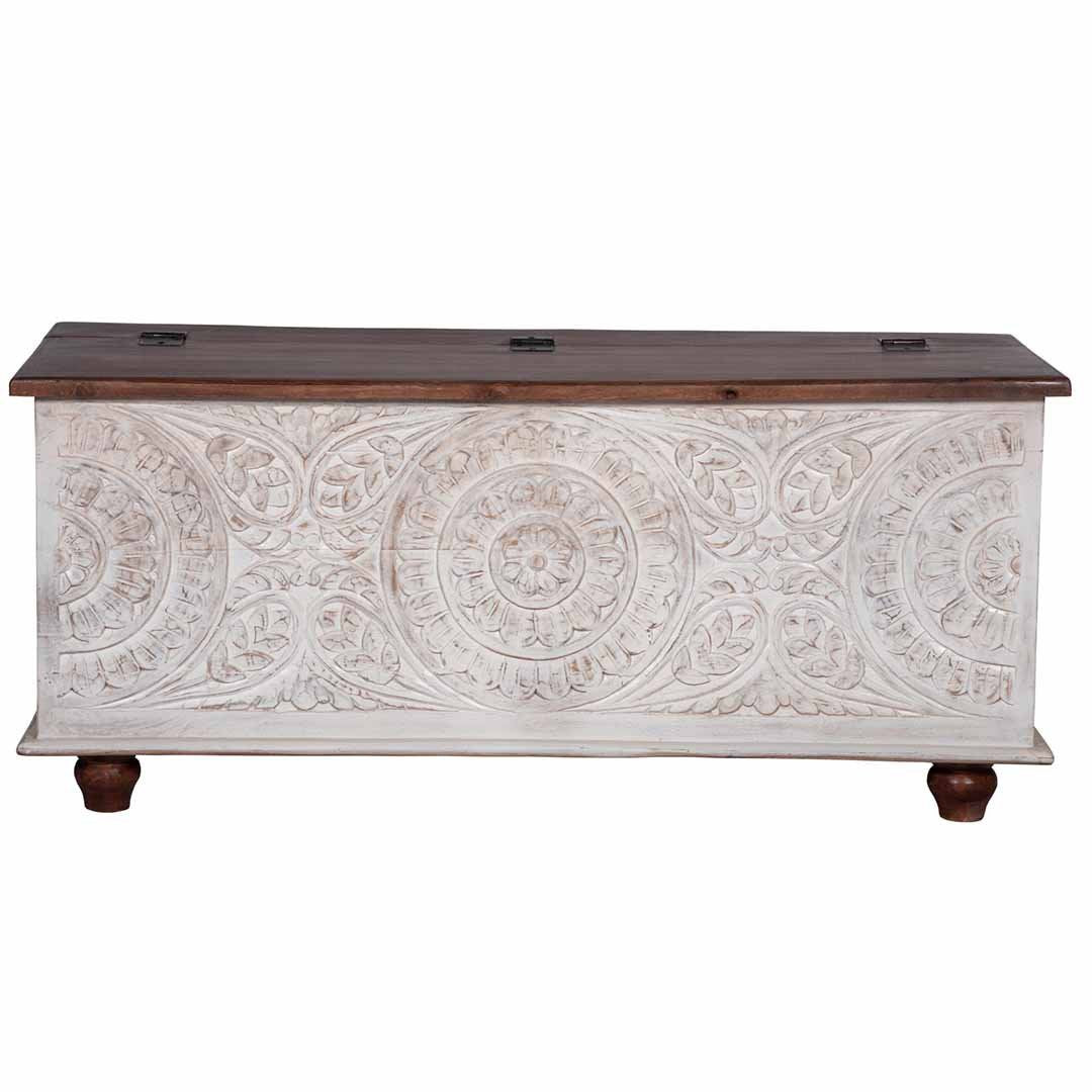 Decorative wooden chest with intricate carvings on a white background