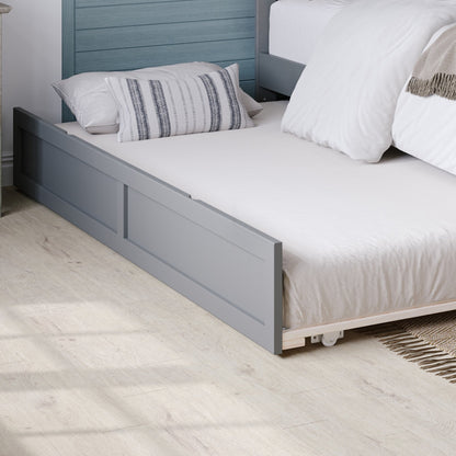 Gray bed frame with white bedding and pillows in a bedroom setting.