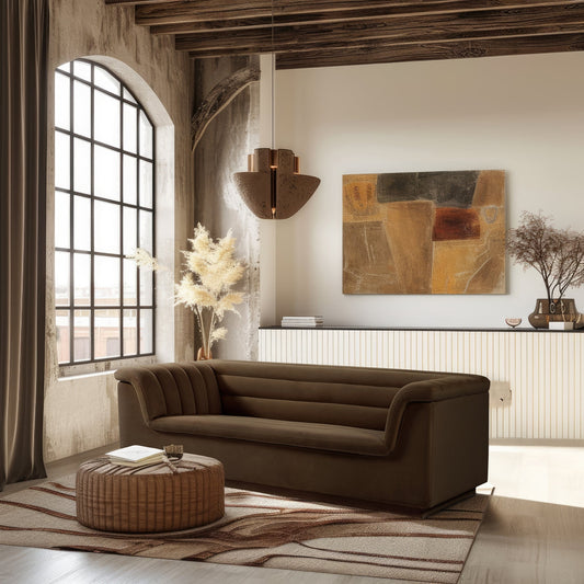 Modern living room with a brown sofa, abstract painting, and decorative elements.