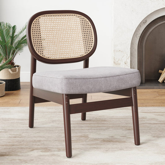 Chair with wicker backrest and gray cushion in a room setting