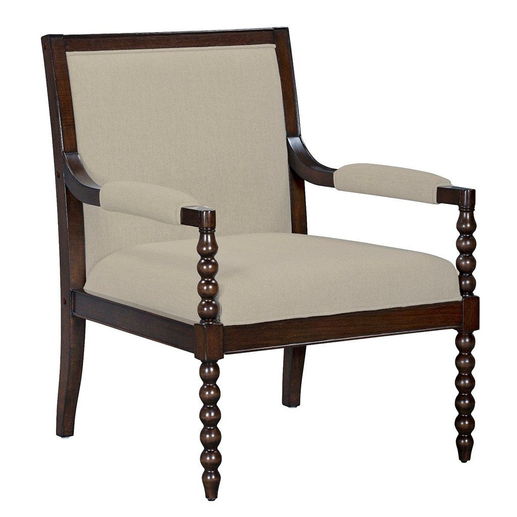 Chair with wooden frame and beige cushion on a white background