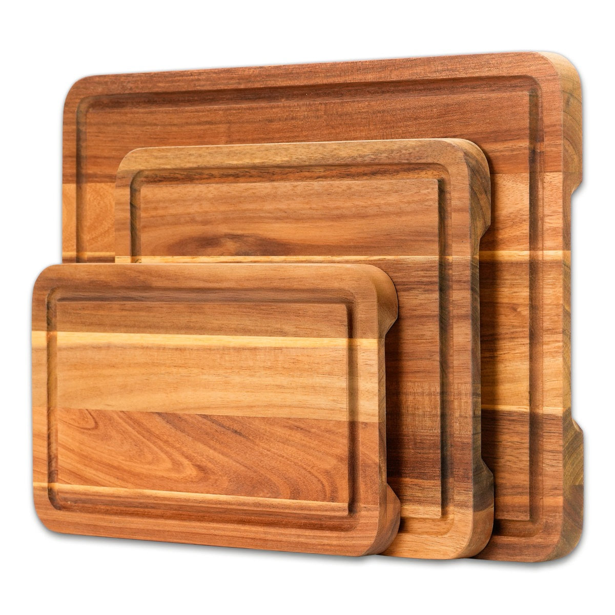 Set of wooden cutting boards of different sizes on a white background