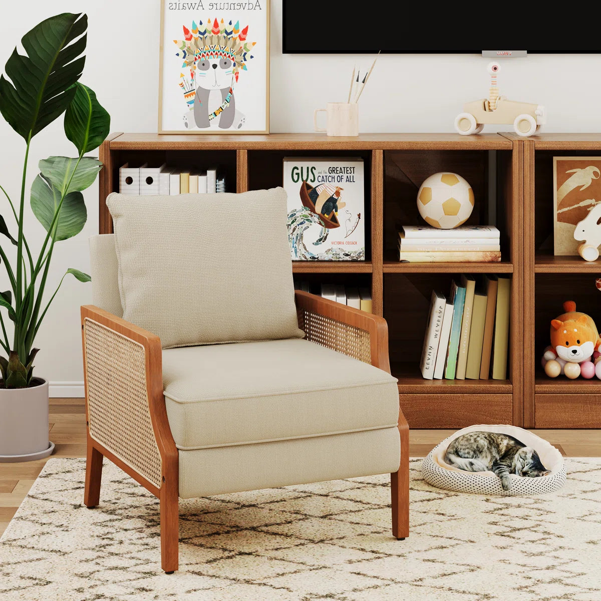 Beige armchair in a living room with a bookshelf and decorative items.