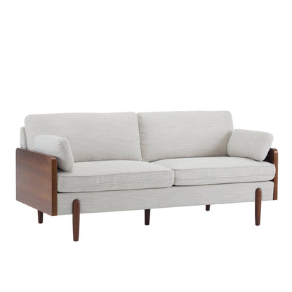Gray sofa with wooden armrests and legs on a white background
