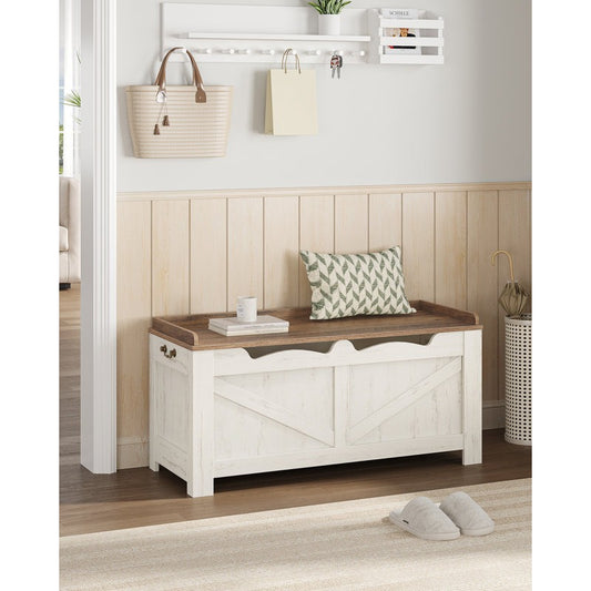 White storage bench with wooden top in a room setting with decor items.