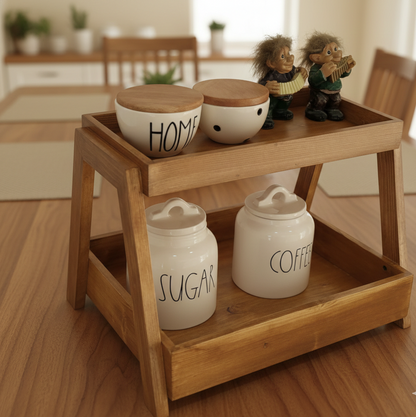 Wooden shelf with ceramic jars labeled 'Home', 'Sugar', and 'Coffee' in a kitchen setting.