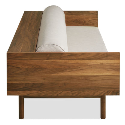 Wooden rolling stand with a roll of fabric on a white background