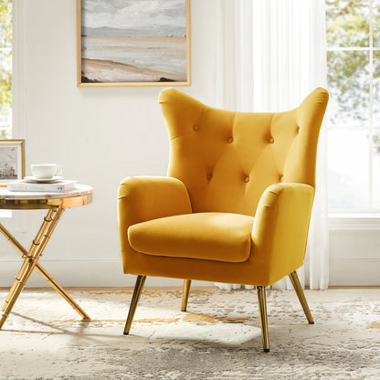 Yellow armchair in a bright room with a small table and artwork on the wall.