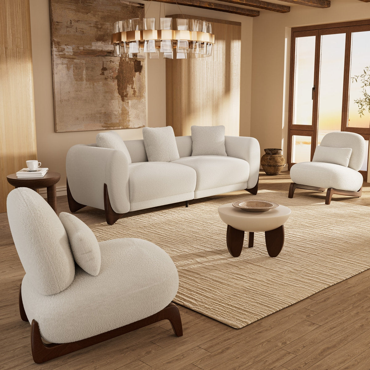 Modern living room with white sofa and armchairs, wooden coffee table, and decorative elements.