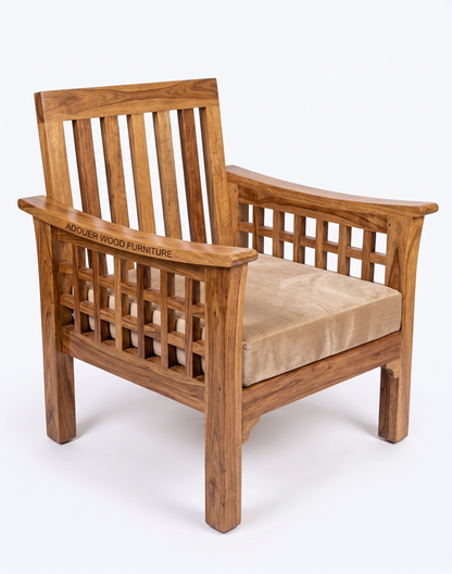 A wooden armchair with a slatted back and armrests, featuring a beige cushion on a white background. The brand name 'ADOUER WOOD FURNITURE' is engraved on the left armrest.