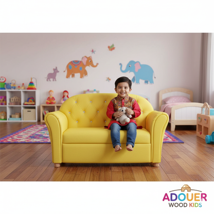Child sitting on a yellow couch in a child-friendly room with wall stickers and toys.