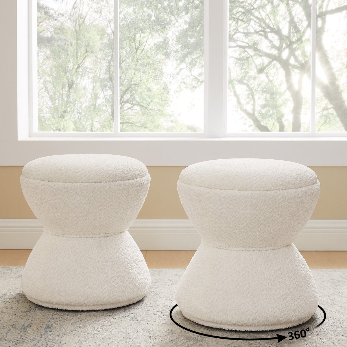Two white stools on a rug with a window in the background