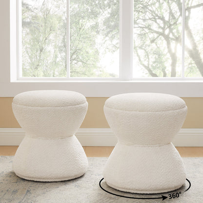 Two white stools on a rug with a window in the background