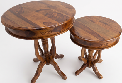 Two wooden round tables with ADOUER branding on a white background