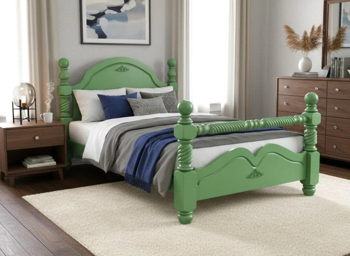 Green bed frame with bedding in a bedroom setting