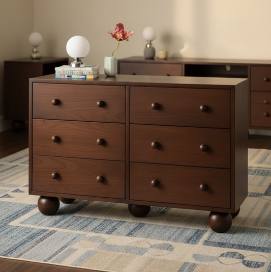 Wooden dresser with multiple drawers in a room setting