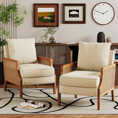 Two beige armchairs with wooden frames in a living room setting.