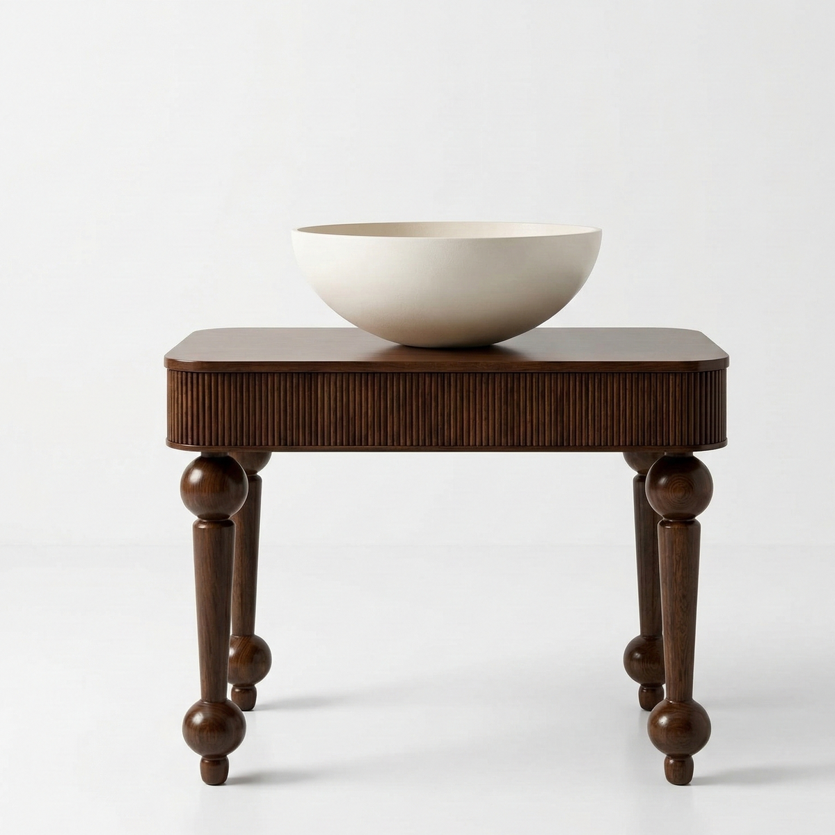 Wooden side table with a white bowl on a light gray background