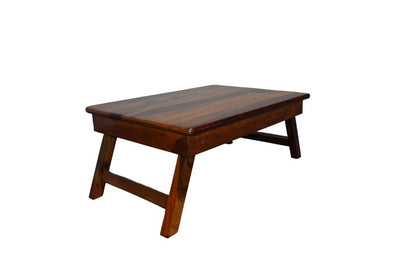 Wooden coffee table on a white background