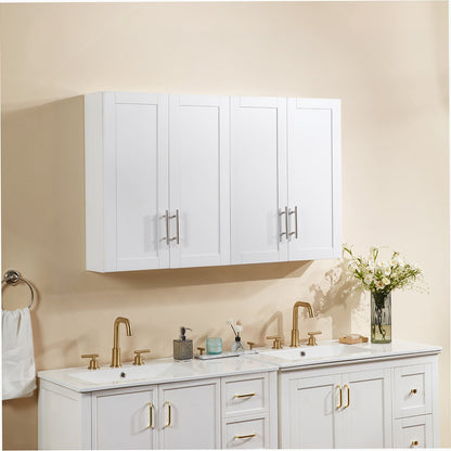 White bathroom vanity with gold fixtures against a beige wall.
