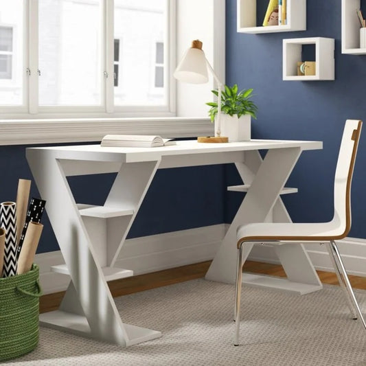 White dining table with a chair in a room with blue walls and a window.