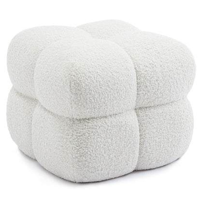 White textured cube-shaped ottoman on a white background