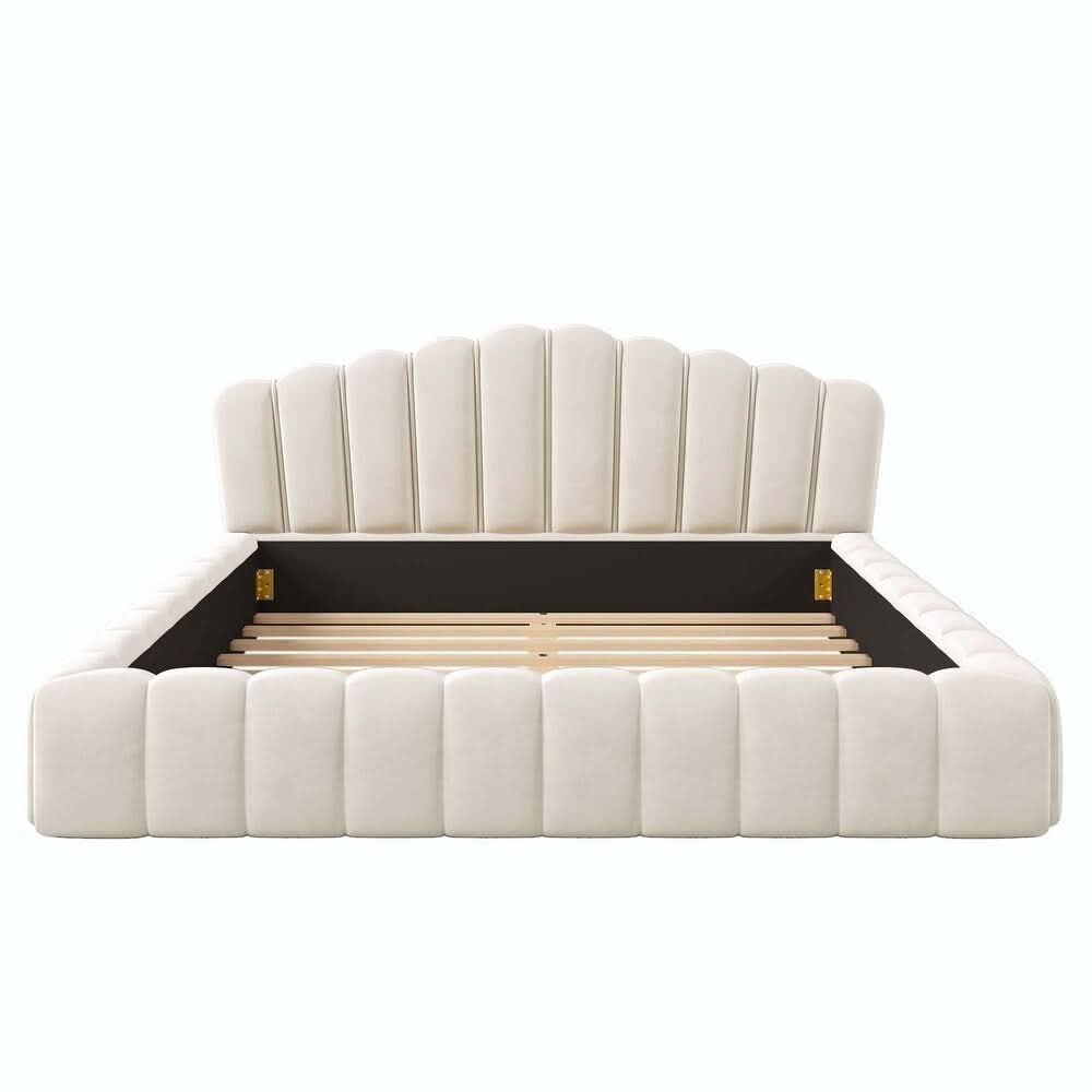 White tufted bed with wooden slats on a white background