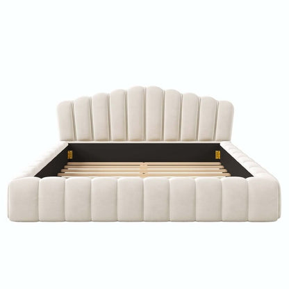 White tufted bed with wooden slats on a white background