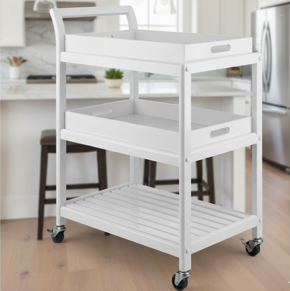White utility cart with three shelves in a kitchen setting