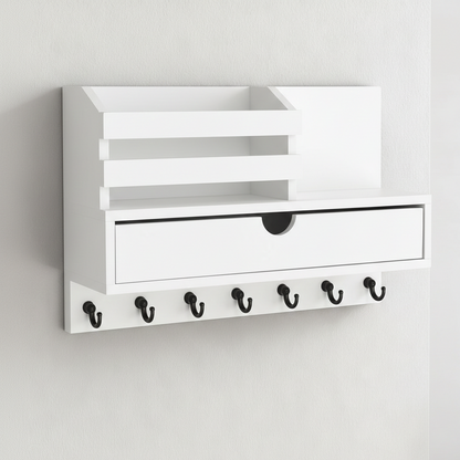 White wall-mounted storage unit with a drawer and hooks on a light gray background