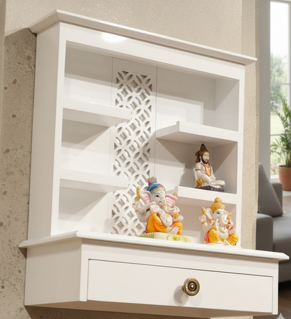 White wall shelf with decorative figurines in a room setting